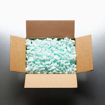 an open box full of packing pellets